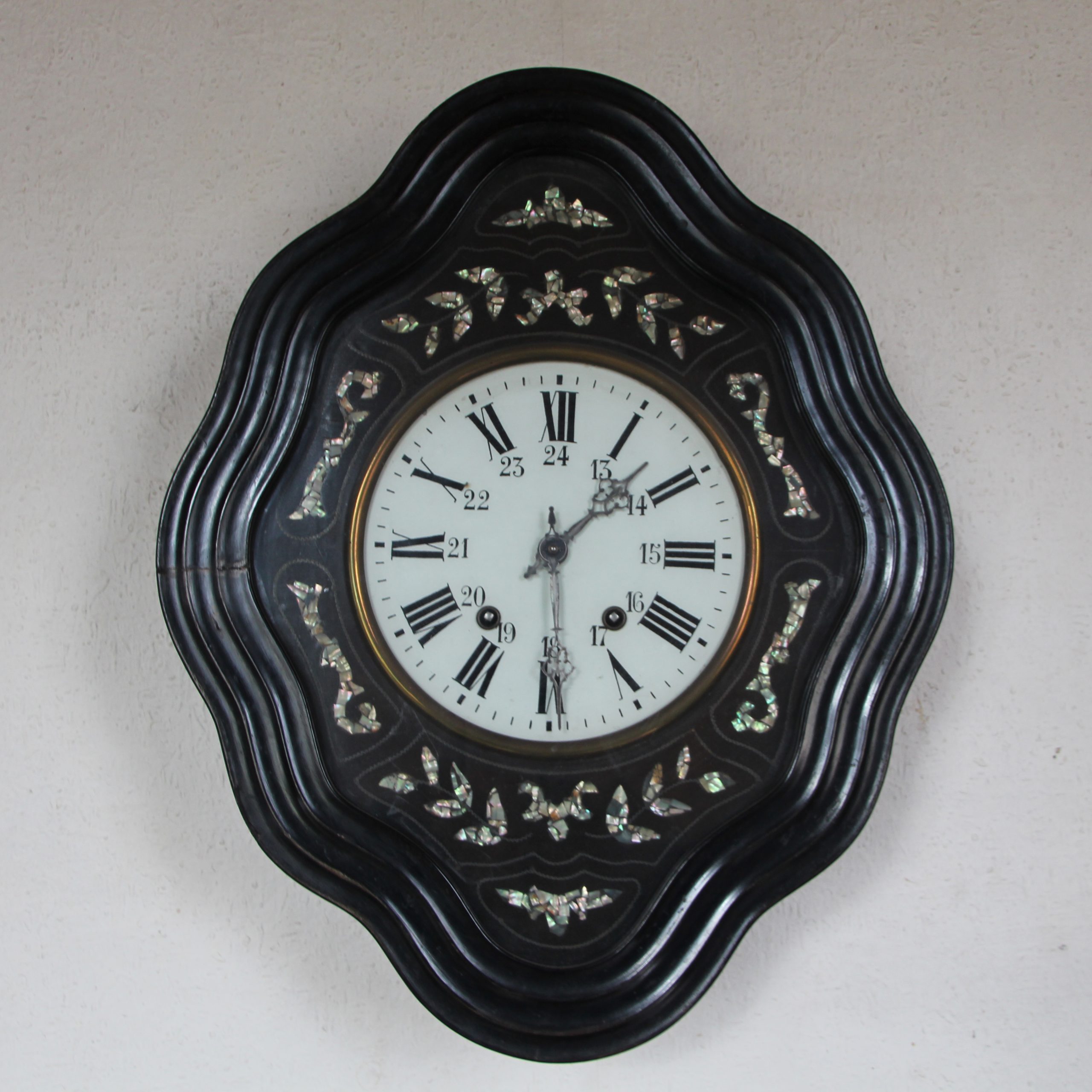 Réparation pendule Œil de bœuf équipé d'un morbier