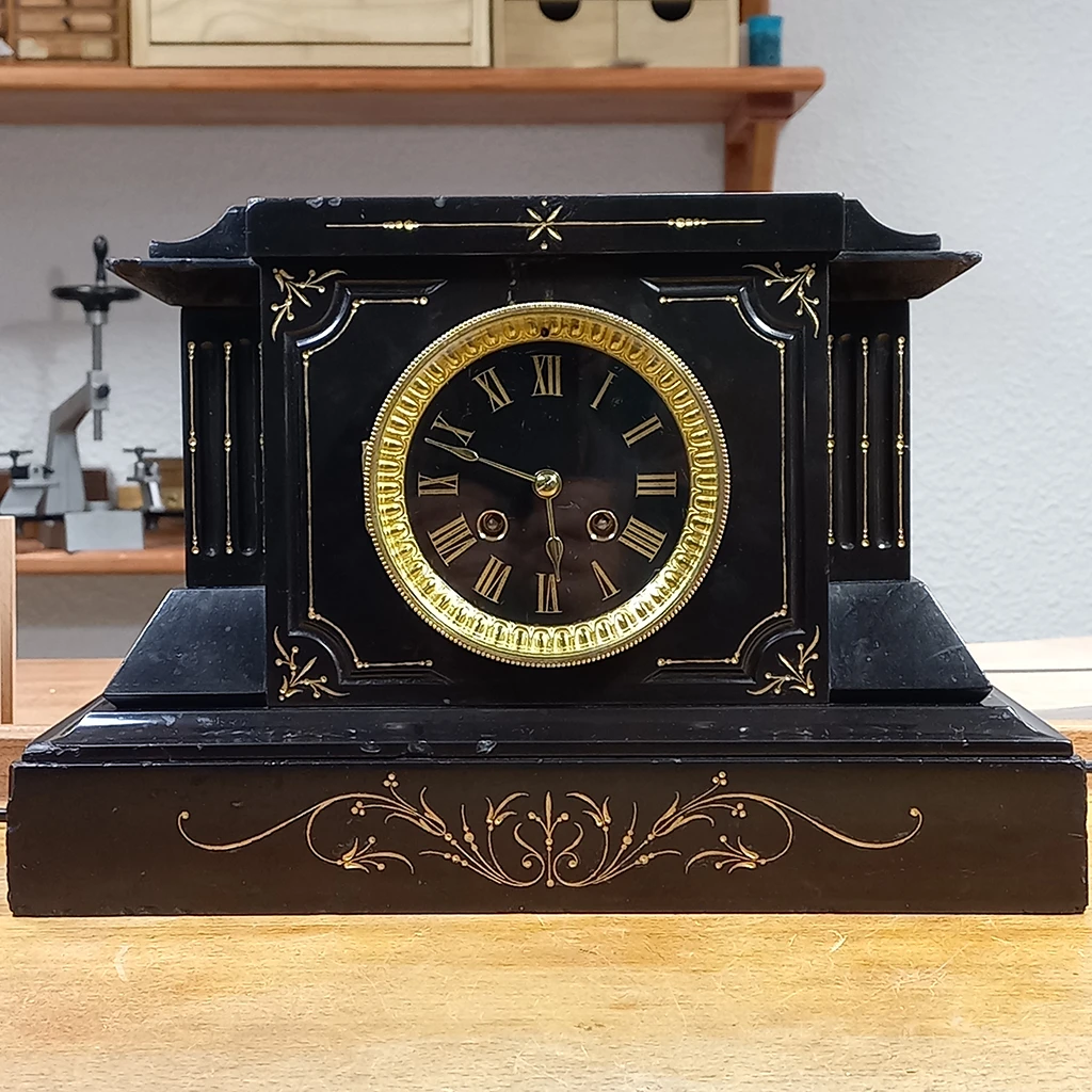 Horloger Lyon réparateur mouvement de paris marbre noir restauré