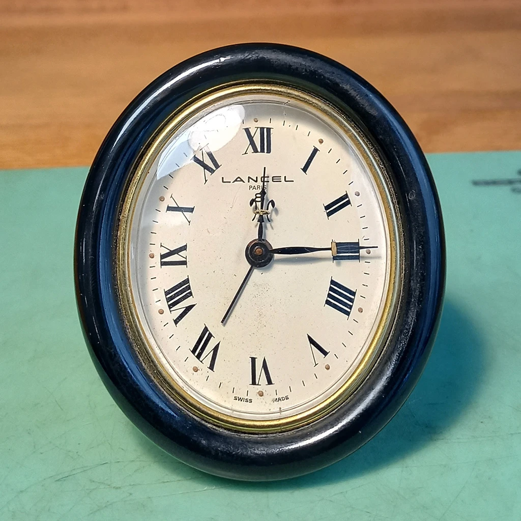 Horloger Lyon réparation reveil Lancel mouvement UTI