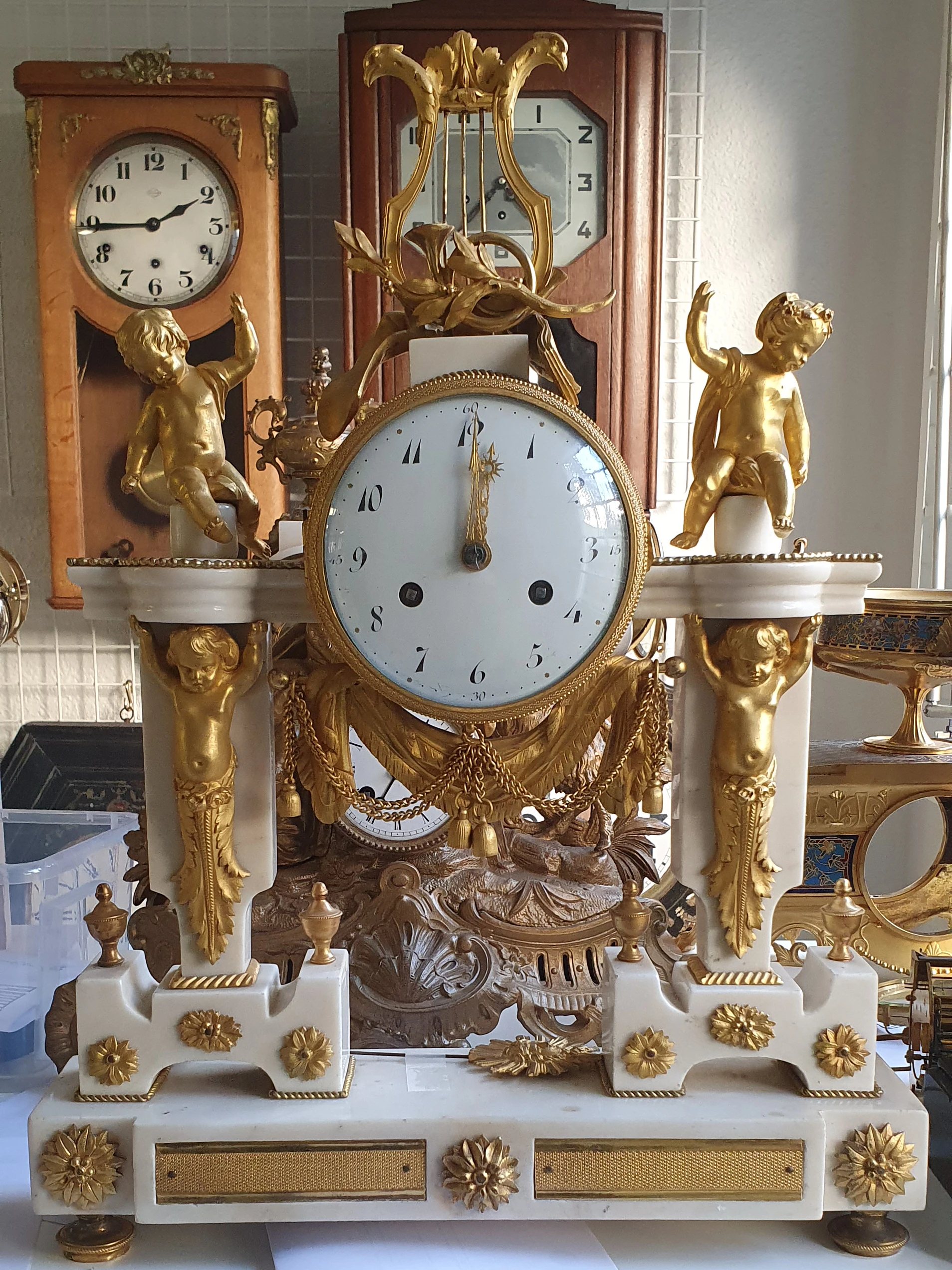 Horloger Lyon réparation pendule portique empire