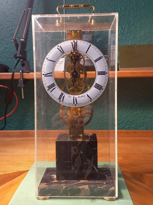 Horloger Lyon réparation pendule squelette baguette Ed Mathey Suisse