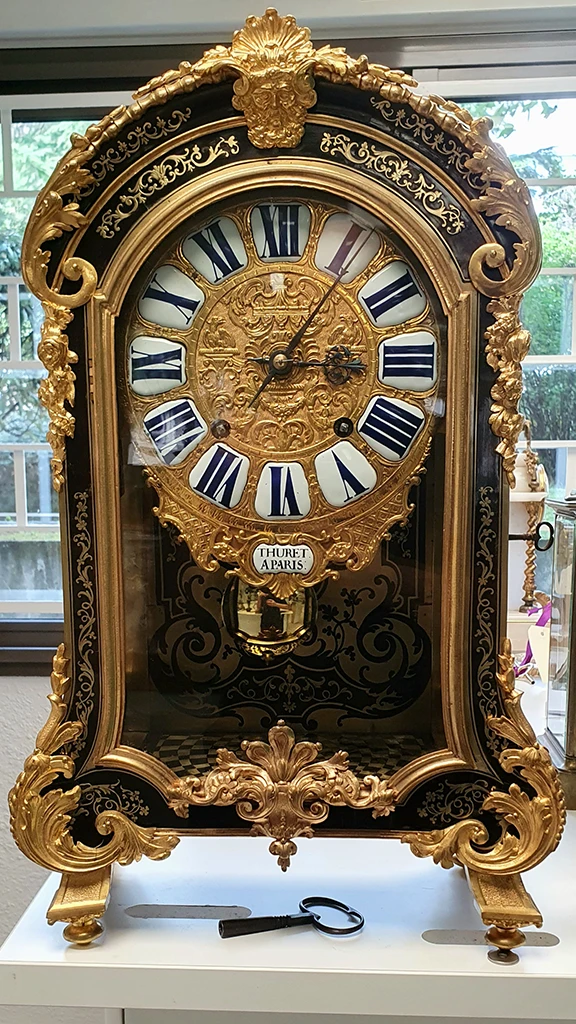 Horloger réparateur Lyon réparation Cartel Louis XIV signé Thuret à Paris