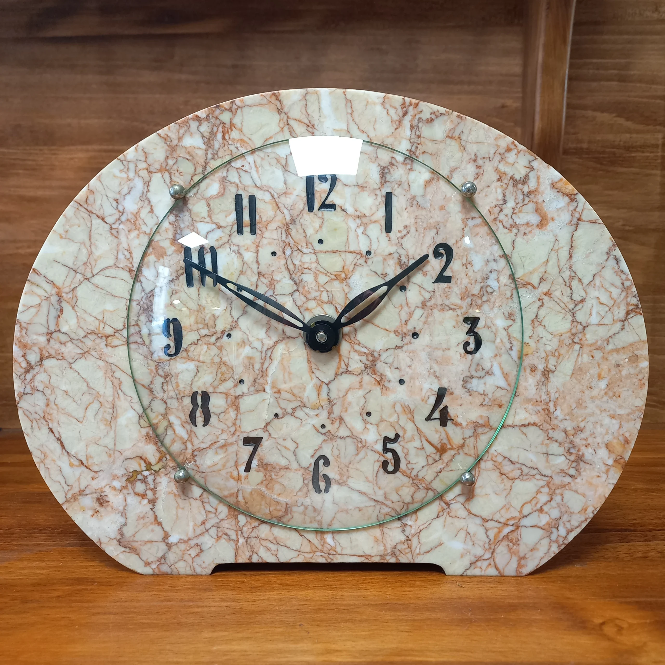 Horloger reparation Lyon pendule marbre rose