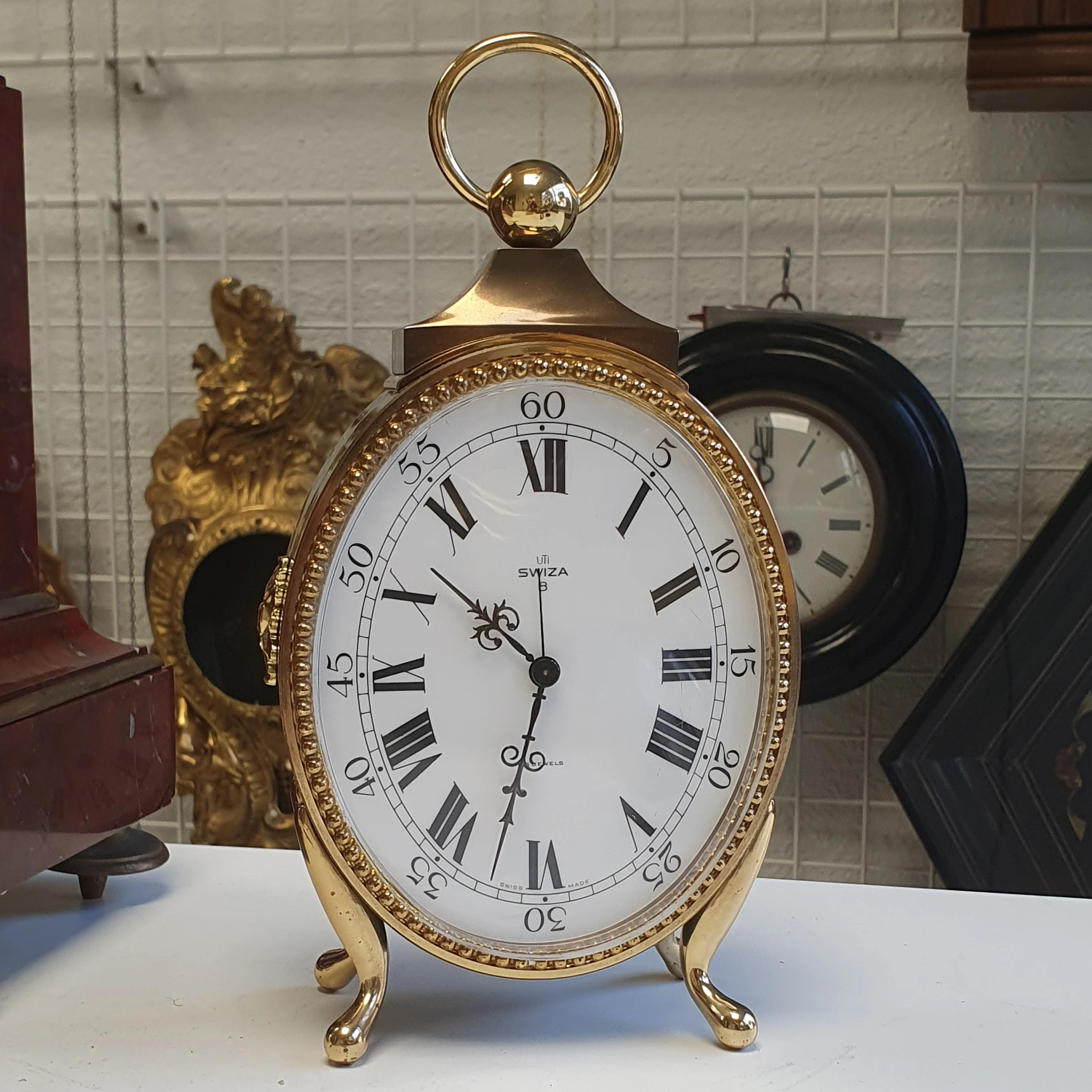 Horloger reparation Lyon réveil de table Swiza